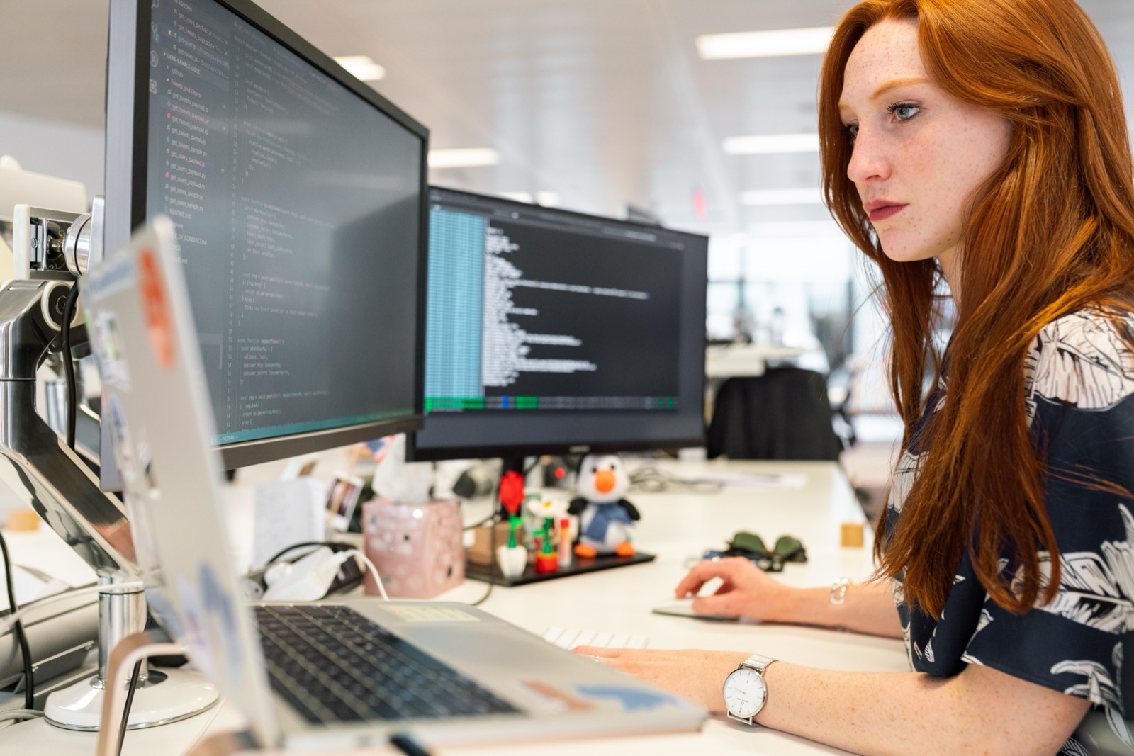 Data engineer portfolio UK — engineer reviewing code and pipeline structure on screen